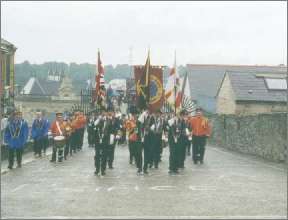 (1) Apprentice Boys walk along the historic walls